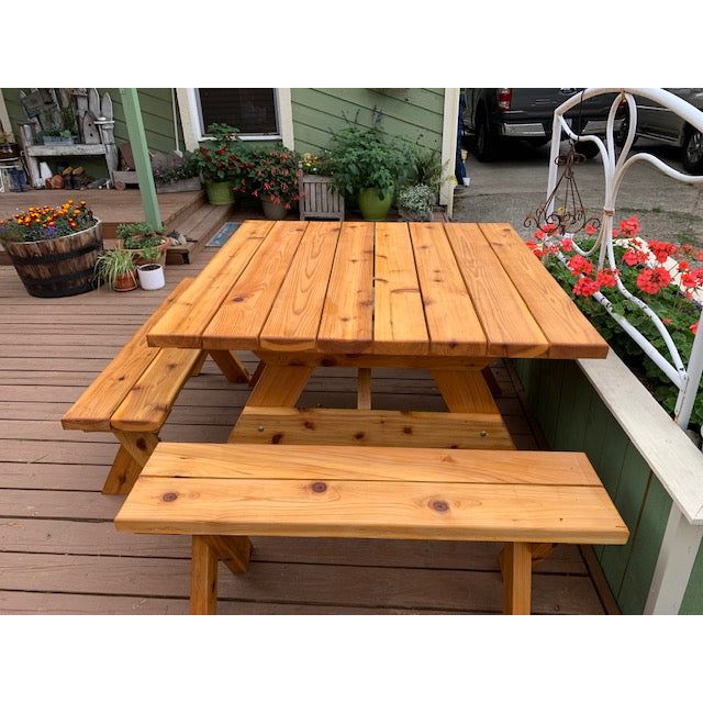 Wood picnic table with detached benches